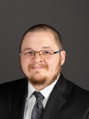 male in black suit