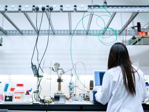 Female biochemical engineer working in lab