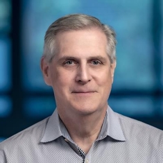 male gray hair and button down shirt